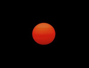 Red-sun-in-a-dark-smoky-sky-lucia-vega.jpg